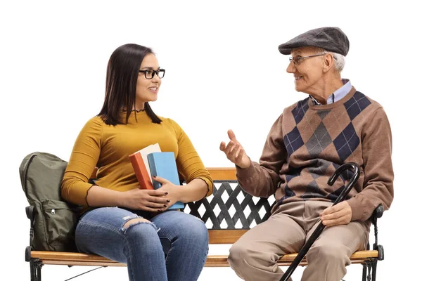 Young Female Student Listening Elderly Man Sitting Bench Isolated White — Stock Photo, Image