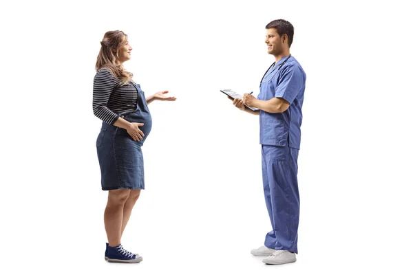 Full Length Profile Shot Pregnant Woman Talking Male Doctor Isolated — Stock Photo, Image