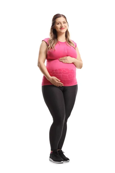 Full Längd Porträtt Gravid Kvinna Rosa Topp Och Leggings Leende — Stockfoto