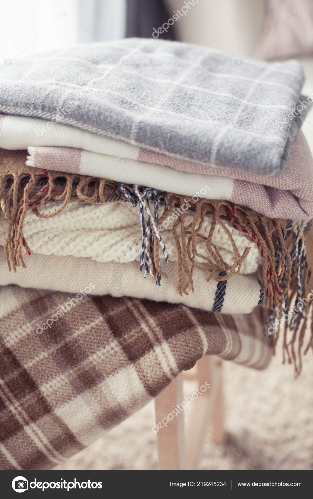 Plaids Autumn Cozy Interior A Stack Of Warm Blankets Lie On A Wooden Chair Autumn Winter Stock Photo