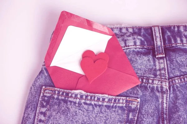 Toned. Jeans on a white background. Pocket. A heart. Valentine\'s Day. Love.