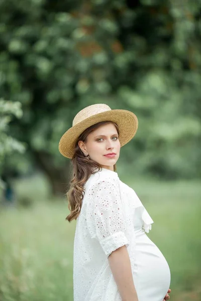 Portrait Young Beautiful Pregnant Woman Pregnant Woman Straw Hat Walks Stock Image