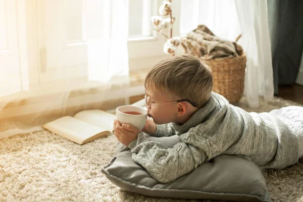 Beautiful Little Boy Knitted Sweater Reading Window Mug Hot Tea — Stock Photo, Image