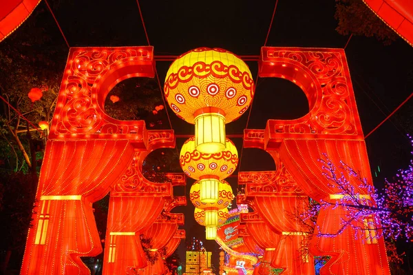 The Zigong Lantern Festival in Zigong, Sichuan, China. This is one of the largest Chinese lantern festivals and is celebrated around Chinese New Year. Colorful lanterns above a walkway.