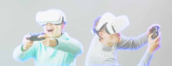 Man and woman with virtual reality headset are playing game. Image with hologram effect.
