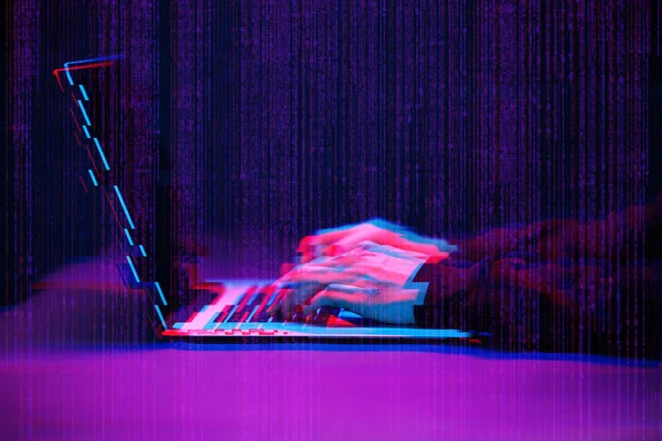 Hacker working with laptop in dark room with digital interface around. Image with glitch effect. — Stock Photo, Image