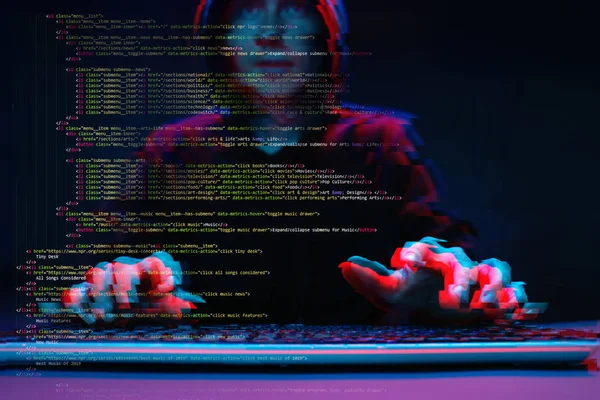 Hacker working with computer in dark room with digital interface around. Image with glitch effect. — Stock Photo, Image