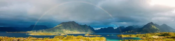 Panoramic photo of rainbow, sea, hills, blue sky in Norway on summer. — Stock Photo, Image