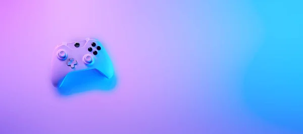 Gamepad in violette en blauwe neon kleuren. — Stockfoto
