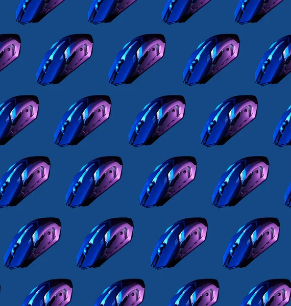 Seamless pattern with games mouse on blue background.