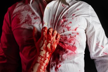 Murderer in white bloody shirt with victim. clipart