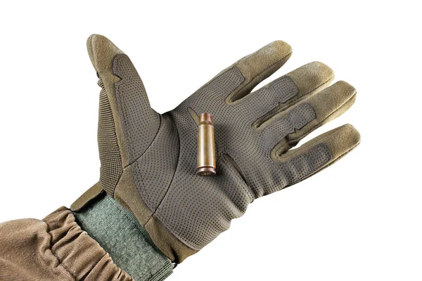 Soldier arm holding Ak 47 rifle bullet shell. — Stock Photo, Image