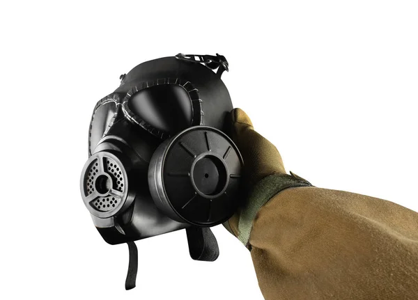 Isolated first person view military hand holding gas mask.