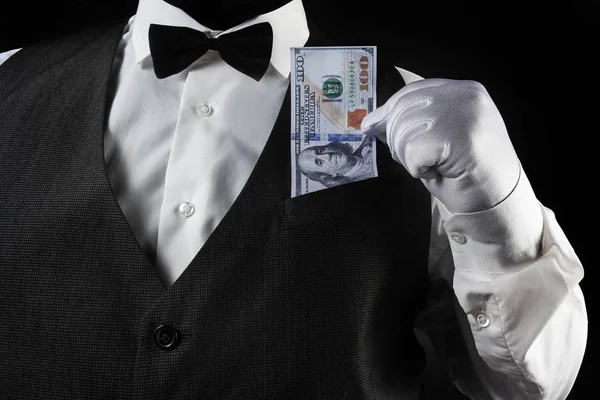 Cameriere tirando fuori dollari in guanto bianco . — Foto Stock