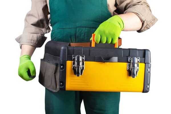 Trabalhador isolado em roupa geral verde com caixa de ferramentas . — Fotografia de Stock