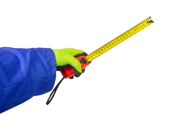 Ізольована рука працівника в рукавичках тримає вимірювальну рулетку . — стокове фото