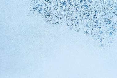 Kış arkaplanı, penceredeki don. Buzlu cam.