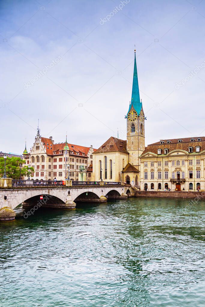 View of the historic city center of Zurich with famous Fraumunster Church and munsterbrucke with river Limmat, Canton of Zurich, Switzerland
