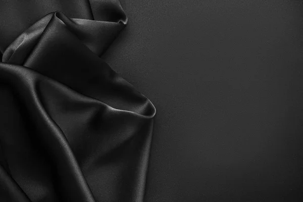 Black luxury wavy rippled glossy silk drapery cloth fabric — Stock Photo, Image