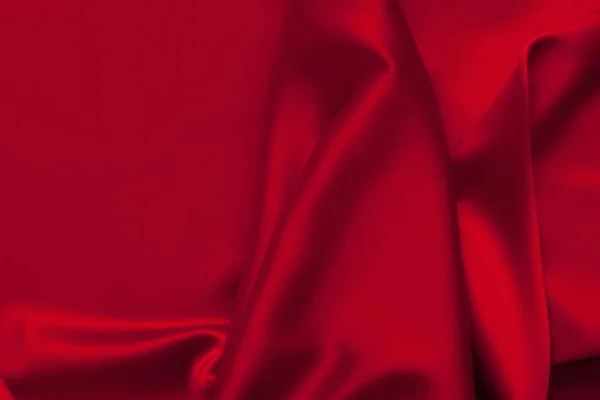 Luxe rood satijn stof doek abstracte achtergrond — Stockfoto