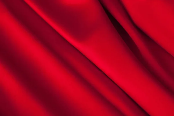 Luxo vermelho tecido de cetim pano abstrato fundo — Fotografia de Stock