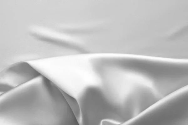 Golfde witte zijde stof satijn doek golven achtergrond — Stockfoto