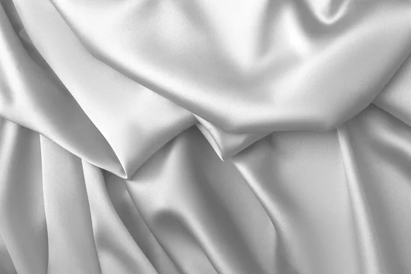 Rippled white silk fabric satin cloth waves background — Stock Photo, Image