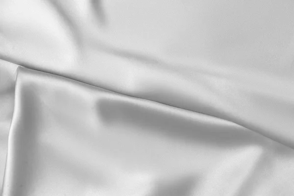 Sakinleştirmek beyaz ipek kumaş saten kumaş dalgalar arka plan — Stok fotoğraf
