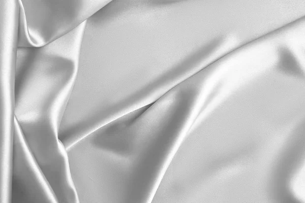 Rippled white silk fabric satin cloth waves background — Stock Photo, Image