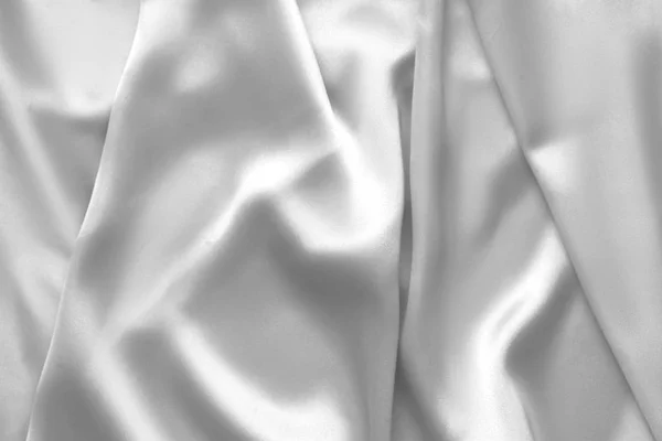 Tissu ondulé en soie blanche toile satinée vagues fond — Photo