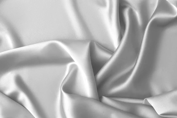 Hullámzott fehér selyem szövet ruha szatén hullámok háttér — Stock Fotó