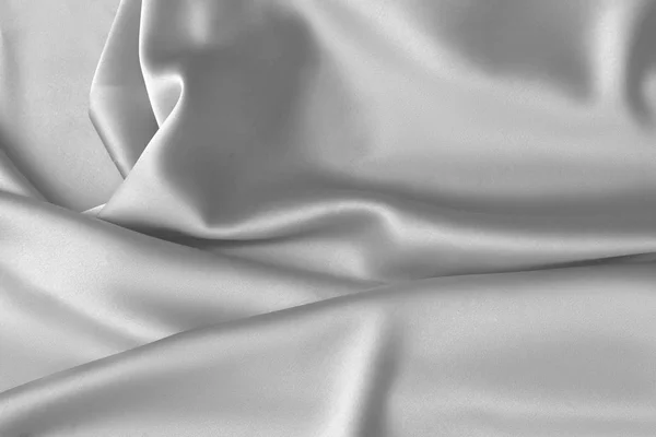 Veckade vit sidentyg satin tyg vågor bakgrund — Stockfoto