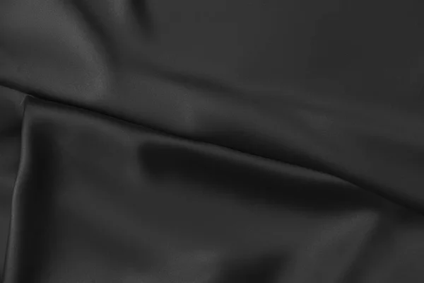 Tecido de pano de pano de seda brilhante ondulado de luxo preto ondulado — Fotografia de Stock