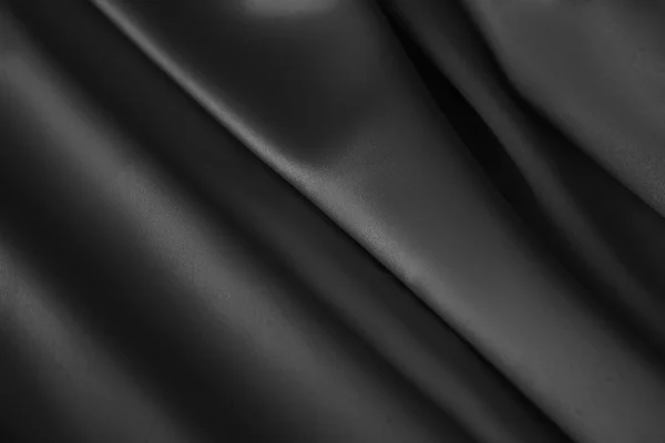 Black luxury wavy rippled glossy silk drapery cloth fabric — Stock Photo, Image