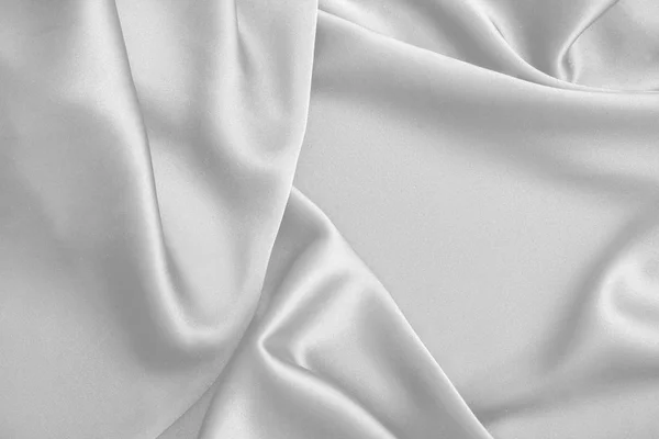 Sakinleştirmek beyaz ipek kumaş saten kumaş dalgalar arka plan — Stok fotoğraf