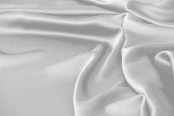 Κυματιστό λευκό μεταξωτό ύφασμα σατέν ύφασμα κύματα φόντο — Φωτογραφία Αρχείου