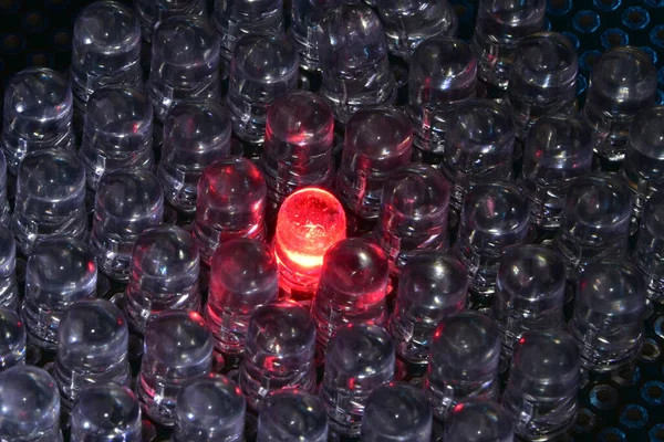 Low-power semiconductor red LEDs in transparent plastic housing. Demonstration of the classic indicator for electronic systems.