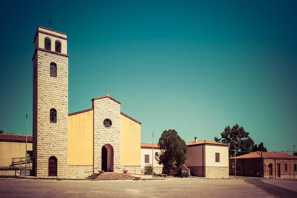 Square and small church in sardinian village of Santa Maria La Palma, near the city of Alghero and Capo Caccia gulf