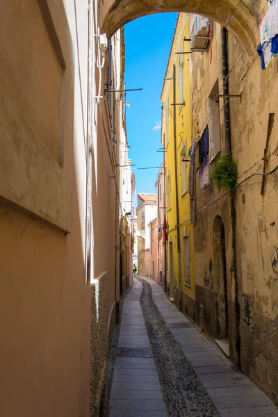 Beautiful deserted alley in a italian old city in a sunny day