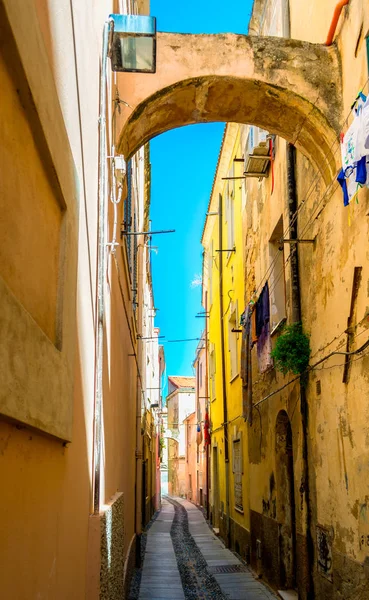 Beautiful deserted alley in a italian old city in a sunny day