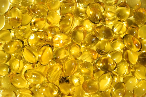 Montón Cápsulas Amarillas Aceite Oro Pescado Omega Capsulas Pilas Aceite — Foto de Stock