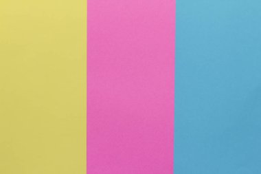 Yaratıcı geometrik Kağıt arka plan. Pembe, mavi, sarı renkler. Soyutlama. Şablon. Üstten görünüm.