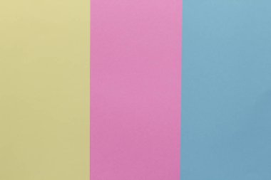 Yaratıcı geometrik Kağıt arka plan. Pembe, mavi, sarı pastel renkler. Soyutlama. Şablon. Üstten görünüm.