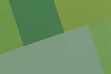 Yaratıcı geometrik Kağıt arka plan. Desen tondan yeşil (tek renkli) benzer. Soyutlama. Şablon. Üstten görünüm. Düz yatıyordu.