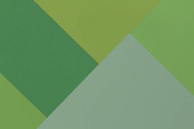 Yaratıcı geometrik Kağıt arka plan. Desen tondan yeşil (tek renkli) benzer. Soyutlama. Şablon. Üstten görünüm. Düz yatıyordu.