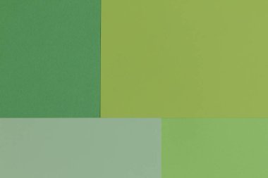 Yaratıcı geometrik Kağıt arka plan. Desen tondan yeşil (tek renkli) benzer. Soyutlama. Şablon. Üstten görünüm. Düz yatıyordu.