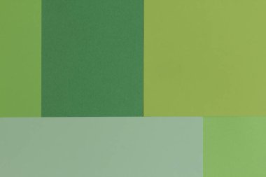 Yaratıcı geometrik Kağıt arka plan. Desen tondan yeşil (tek renkli) benzer. Soyutlama. Şablon. Üstten görünüm. Düz yatıyordu.