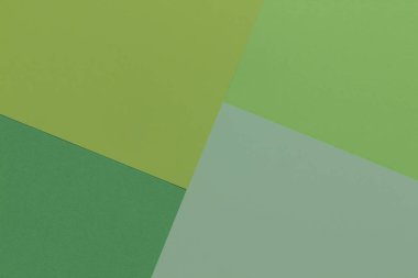Yaratıcı geometrik Kağıt arka plan. Desen tondan yeşil (tek renkli) benzer. Soyutlama. Şablon. Üstten görünüm. Düz yatıyordu.