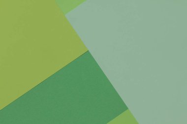 Yaratıcı geometrik Kağıt arka plan. Desen tondan yeşil (tek renkli) benzer. Soyutlama. Şablon. Üstten görünüm. Düz yatıyordu.