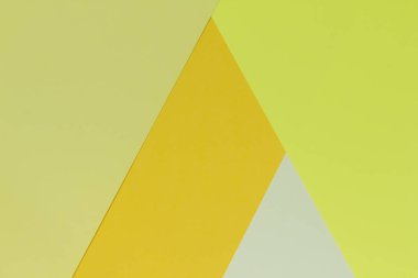 Yaratıcı geometrik Kağıt arka plan. Desen (tek renkli) tondan benzer: sarı. Soyutlama. Şablon. Üstten görünüm. Düz yatıyordu.